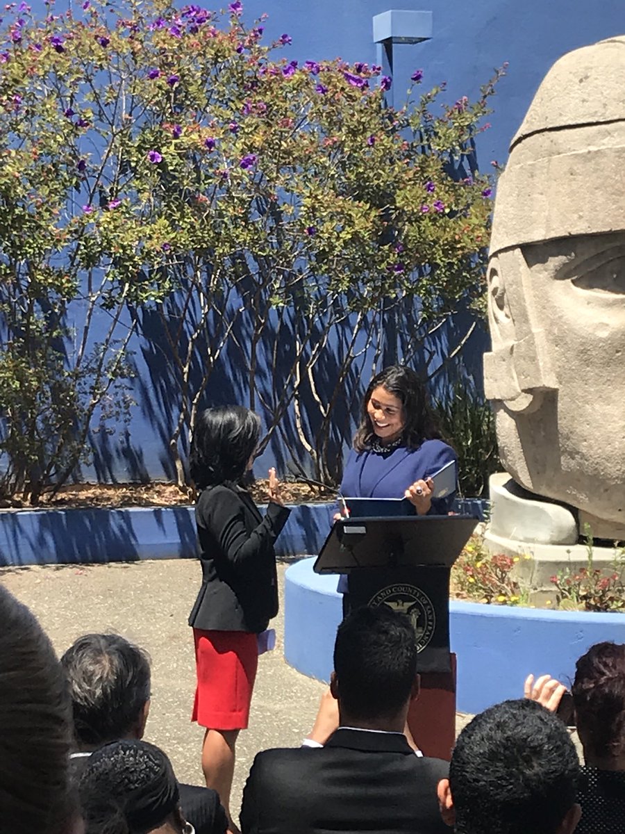 Mayor London Breed administers the oath of office to new CCSF Trustee Ivy Lee at a press conference