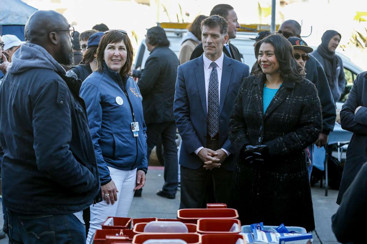 Mayor London Breed with Director Colfax touring a homelessness health fair